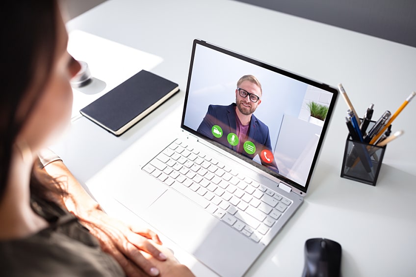 A property owner having a video call with a contractor.