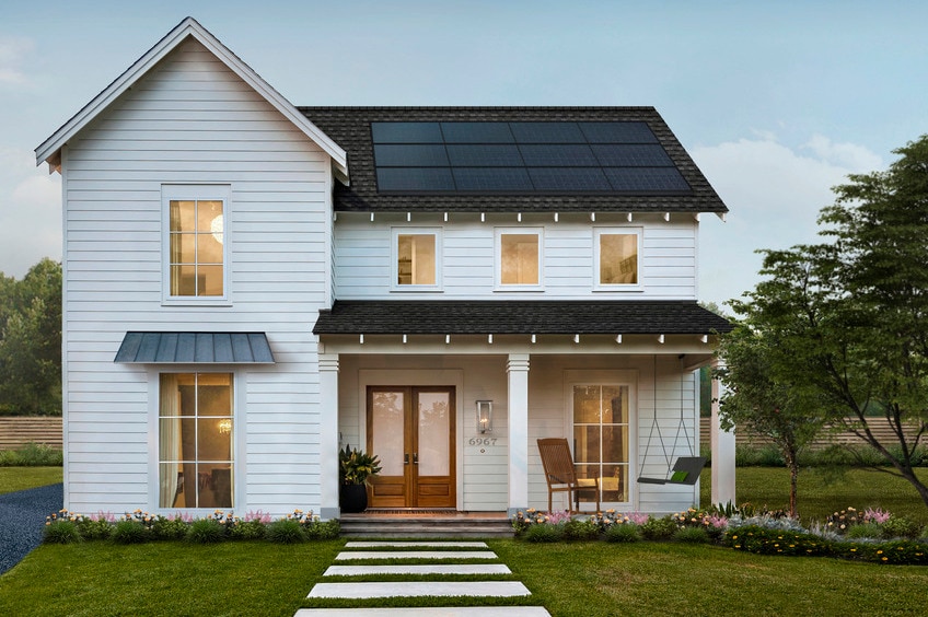 A craftsman-style house with a solar roof