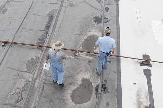 Dave and Wally perform a roof inspection