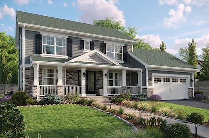 A gray house with slate shingles