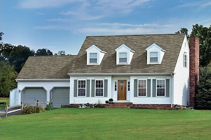 A home image head on showing brown shingles