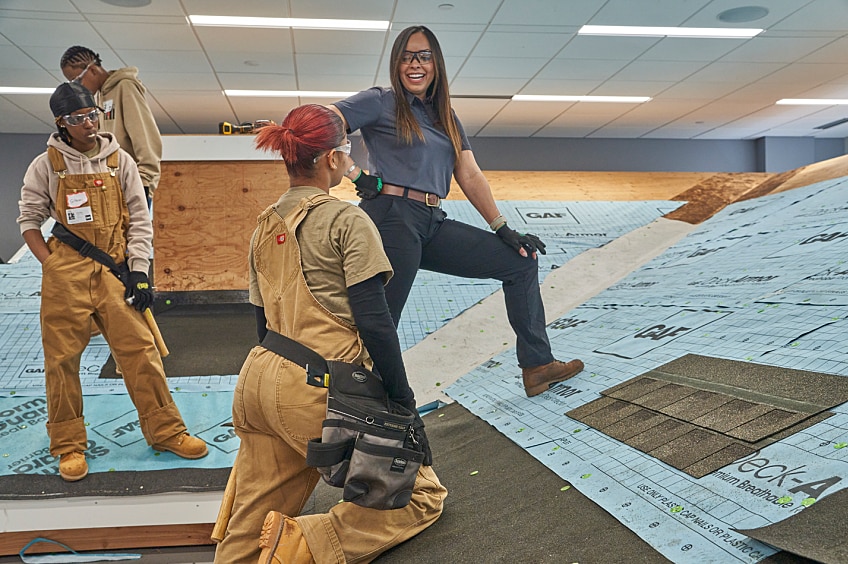 Women in roofing learning during a Roofing Academy training course