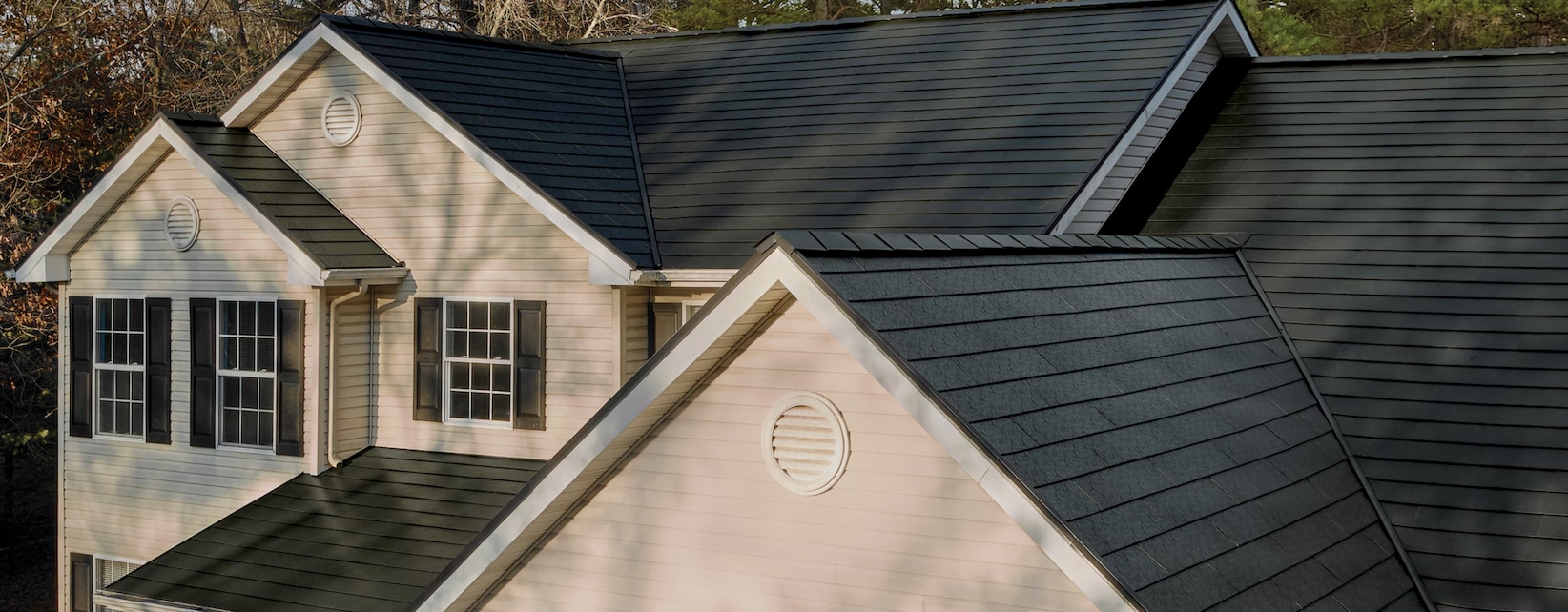 Close up of the roof of a house with the GAF TimberSteel Metal Roofing System installed.