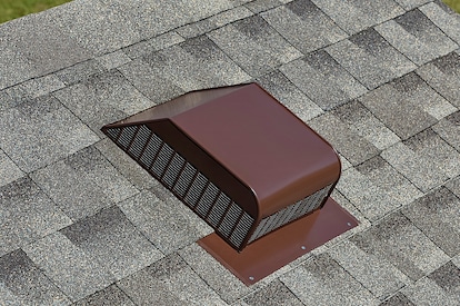 Image of a brown MasterFlow product installed on a grey roof.