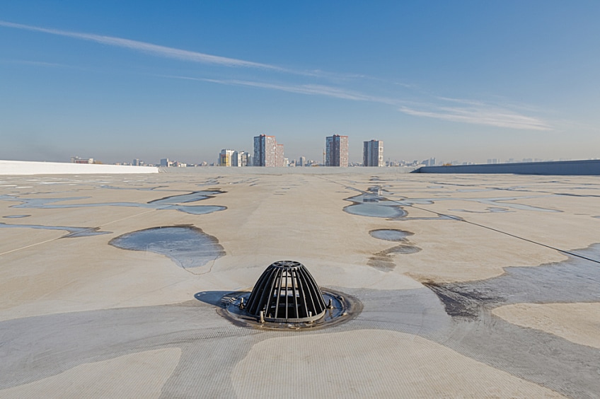 Roofing membrane with ponding water after rain.