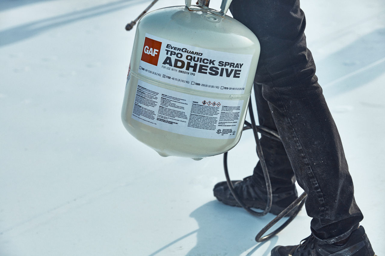 everguard tpo quick spray adhesive Roofer using EverGuard TPO Quick Spray Adhesive to install TPO on a roof