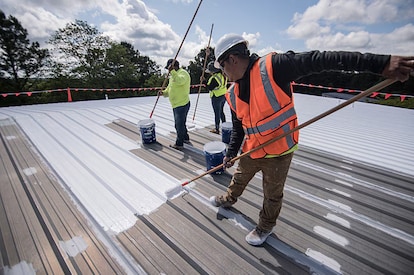 A GAF CoatingsPro+™ Contractor installing GAF products on a roof