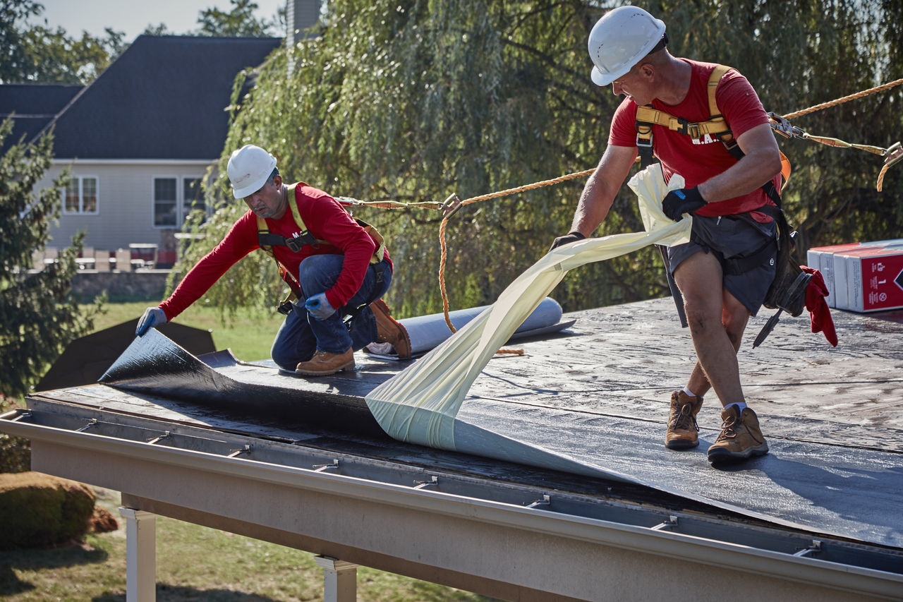 the liberty™ self-adhering base/ply sheet is installed by rolling it out and peeling off the release film the LIBERTY™ Self-Adhering Base/Ply sheet is installed by rolling it out and peeling off the release film