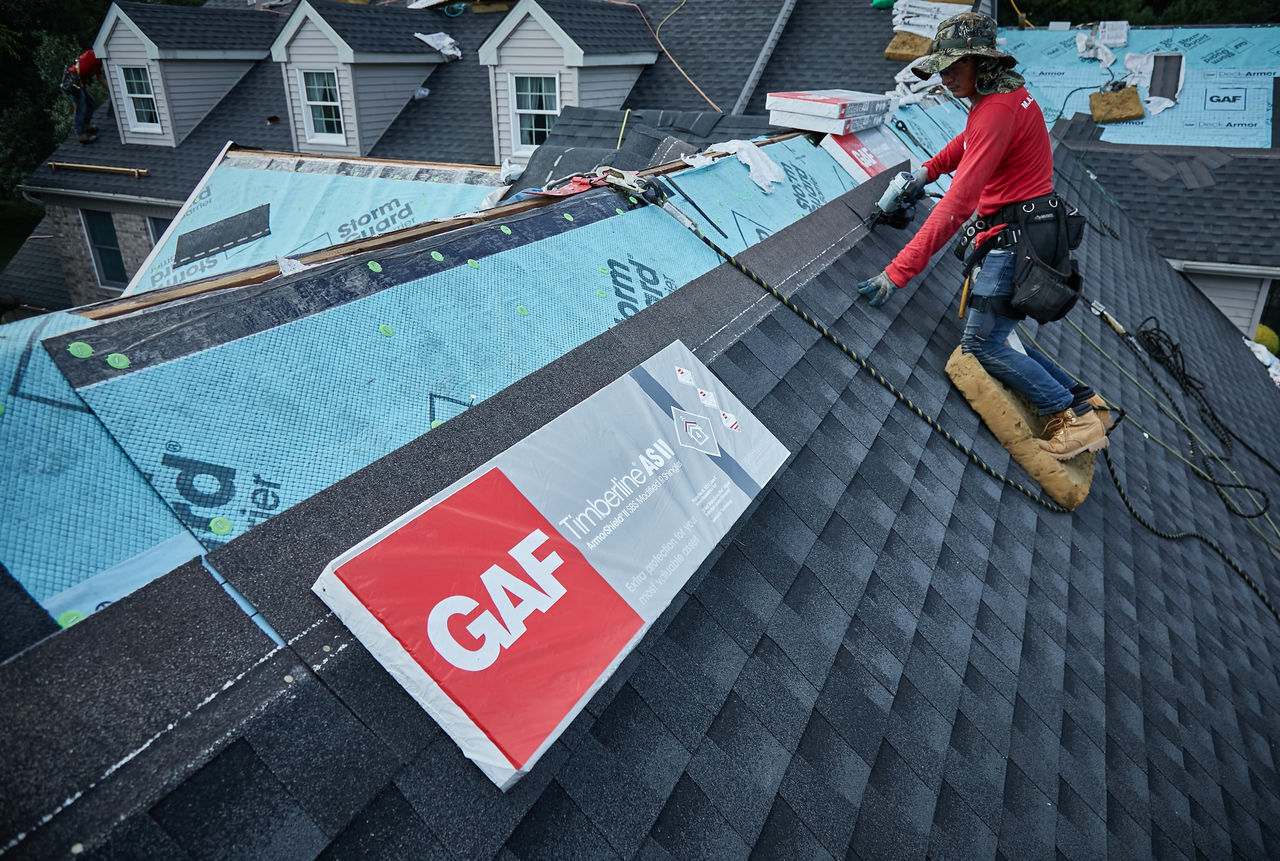 Roofer Installing GAF Timberline AS II Shingles on a Roof