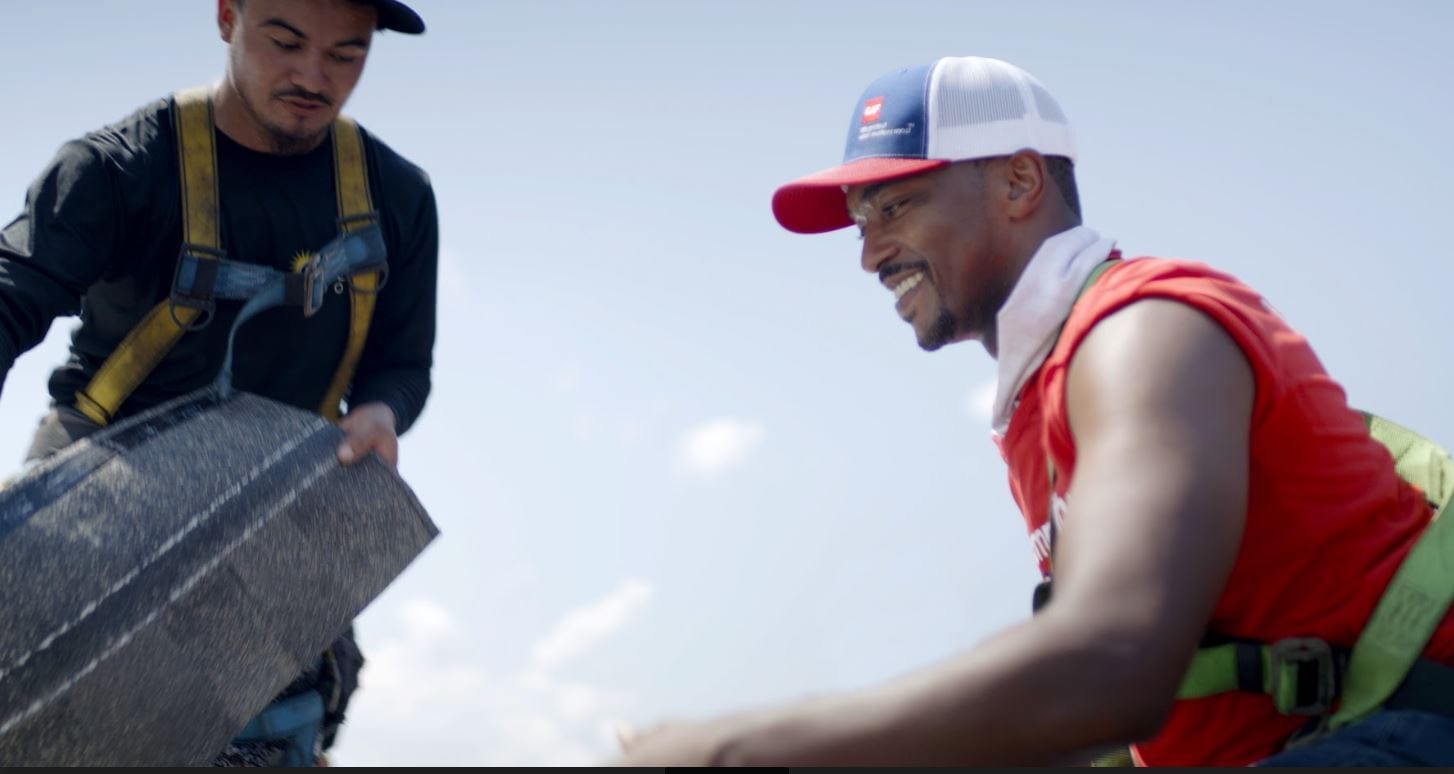 Anthony Mackie on a roof with Communiy Matters