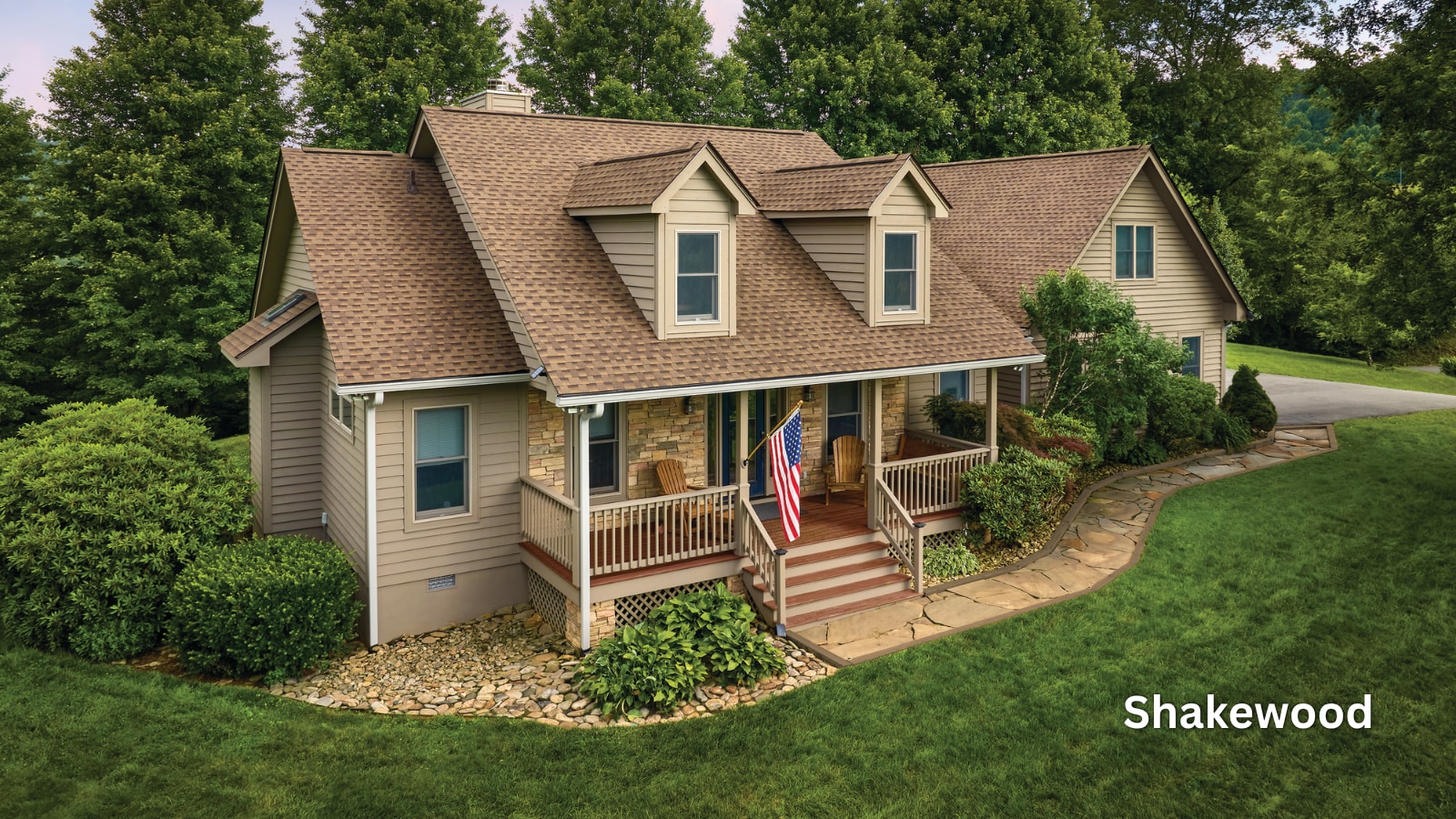 GAF Timberline HDZ shingles in the color Shakewood on the roof of a home. 