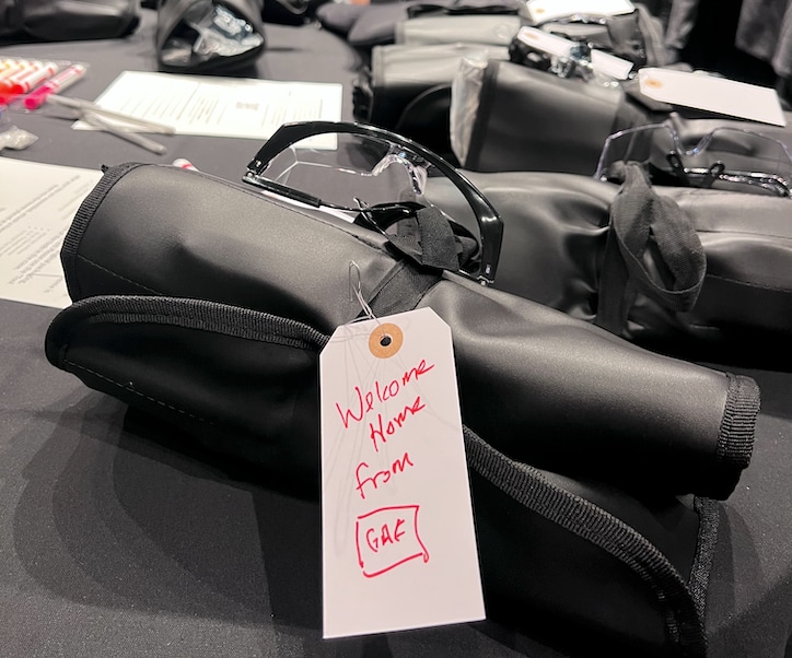 welcome home kits prepared for new homeowners by gaf employees and partners A close up of a welcome home kit prepared for new homeowners by GAF employees and partners