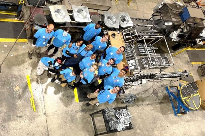 Two employees working at a manufacturing plant