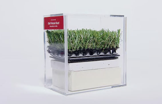 Hands-on roof assembly model made from real and simulated layers in an acrylic box.