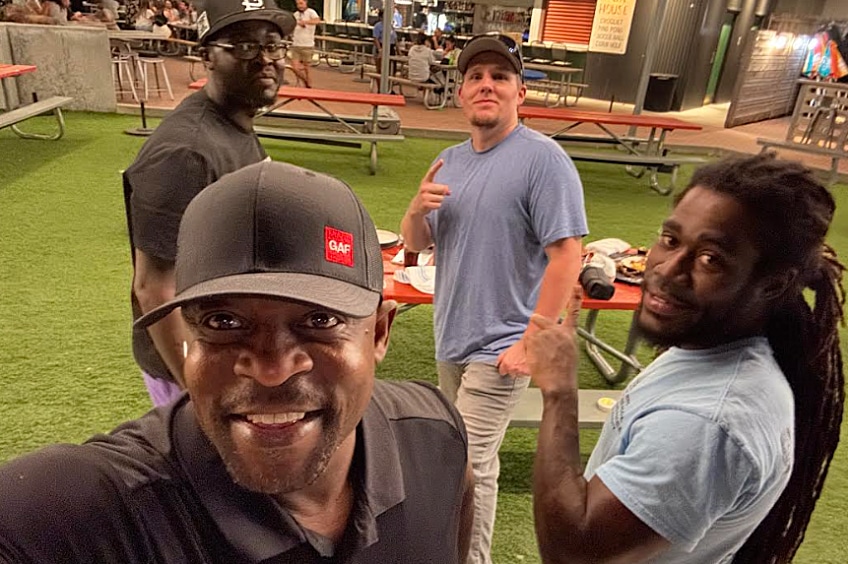 Roof contractor working on roof.