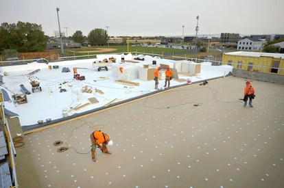 Built up roofing system install on a commercial roof.