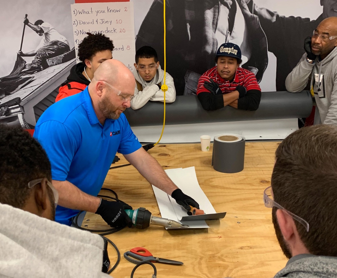 GAF Roofing Academy instructor with students