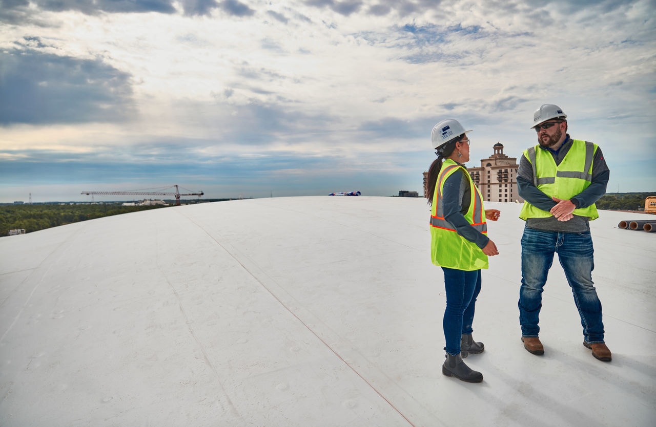 Contractors on Roof of Commercial Building