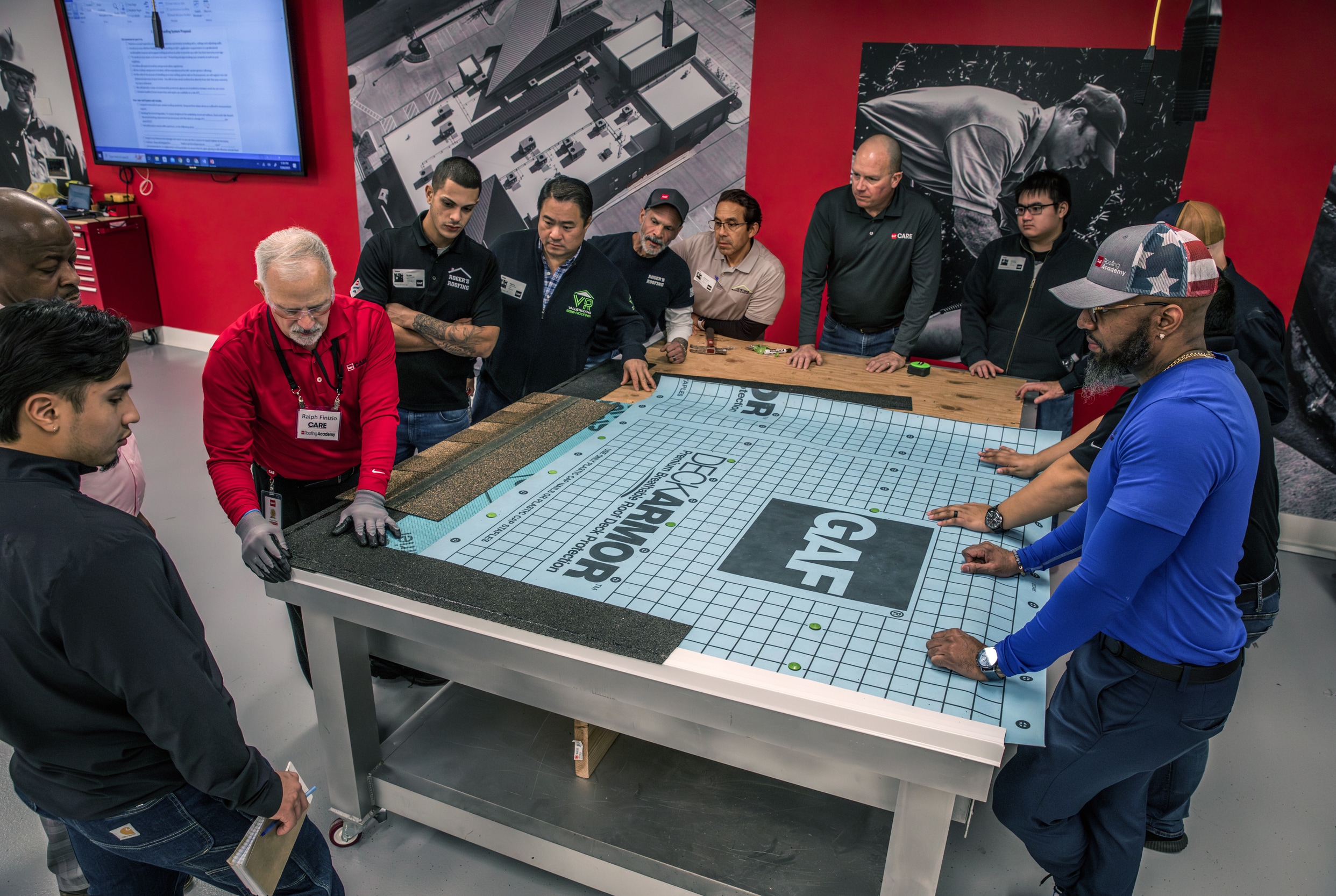 d6bec238-769f-46c3-b12d-42b26849fd28 GAF Roofing Academy Class, hands on instructor-lead training for future roofing professionals.