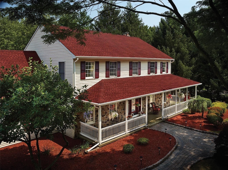 GAF's Timberline HDZ Patriot Red shingles on a two story white home.