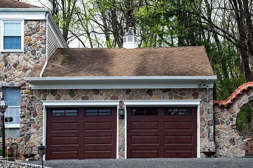 Blue-green algae on the roof of a stone house