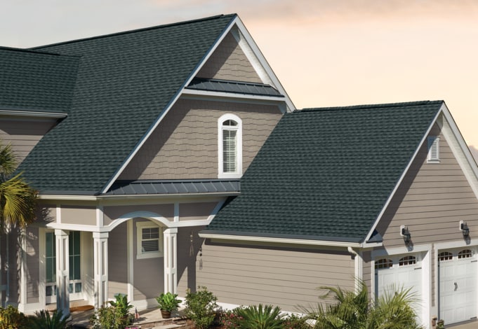 A roof with dark shingles
